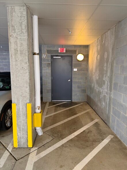 Parking space is next to door to lobby and elevator - 13722 Neil Armstrong Ave