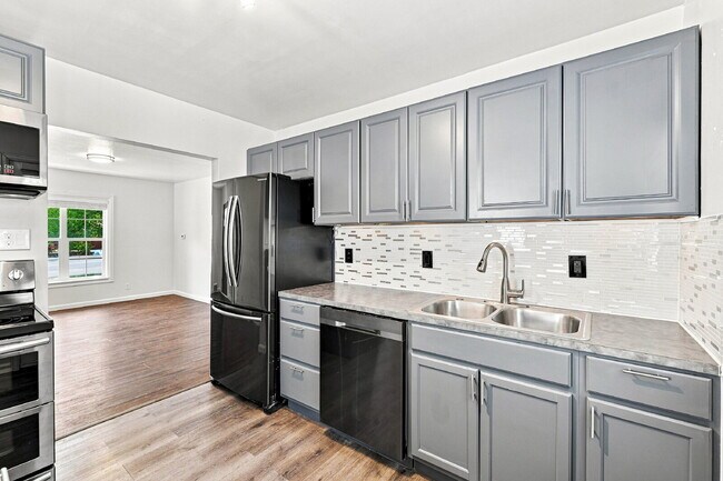 Building Photo - $1,545.95, 2-bed, 1-bath home in Brighton with a large fenced backyard.