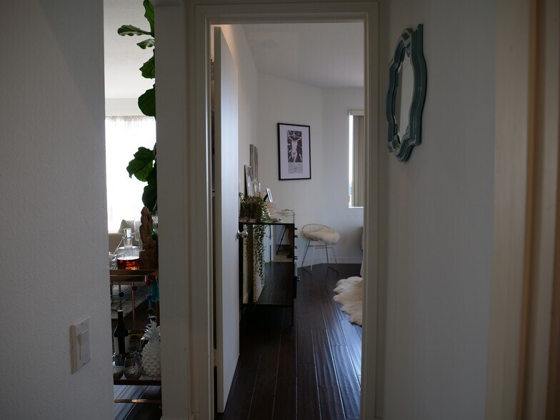 Hall separating bedroom and bathroom - 8960 Cynthia St