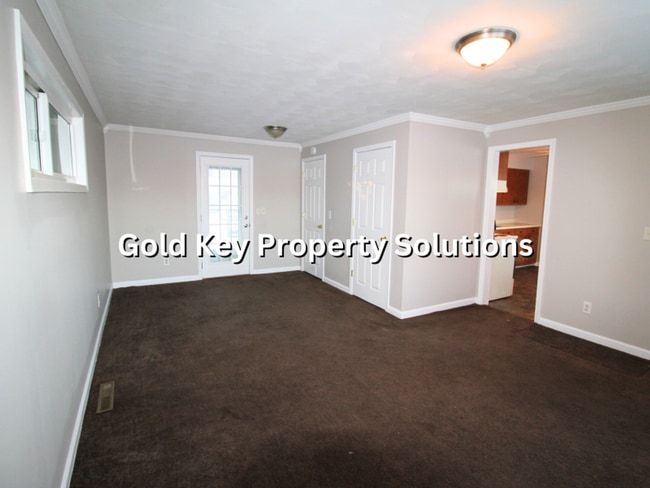 Building Photo - Roomy 4 BR 1 BA House with Back Deck and Shed SECTION 8 APPROVED