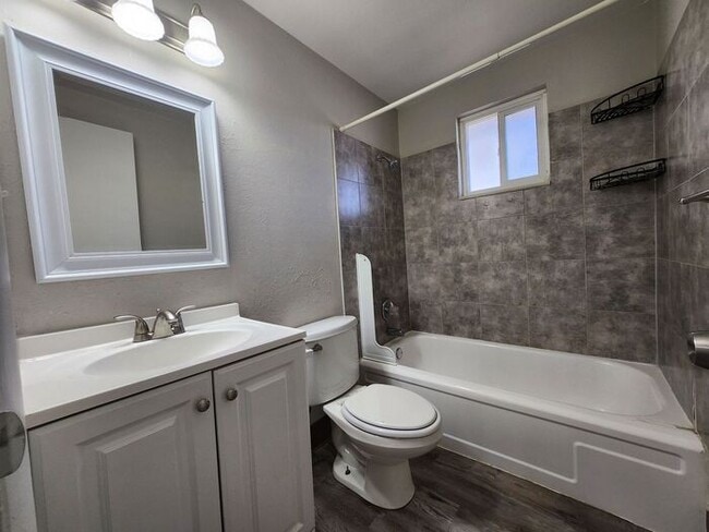 Building Photo - 2-Bedroom Townhome with Fenced Backyard and Modern Updates! |Utilities Included!