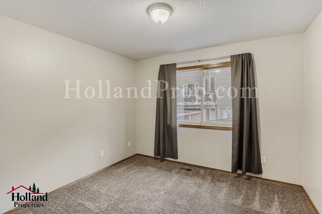 Building Photo - Serene 4-Bed Home with Huge Common Room & Deck!