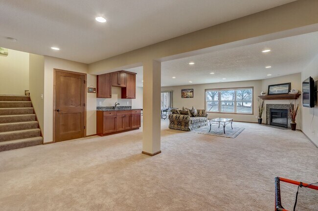 Building Photo - Grand 5 bed 4.5 bath Maple Grove Home w/ 3-Car Garage! Fully Furnished