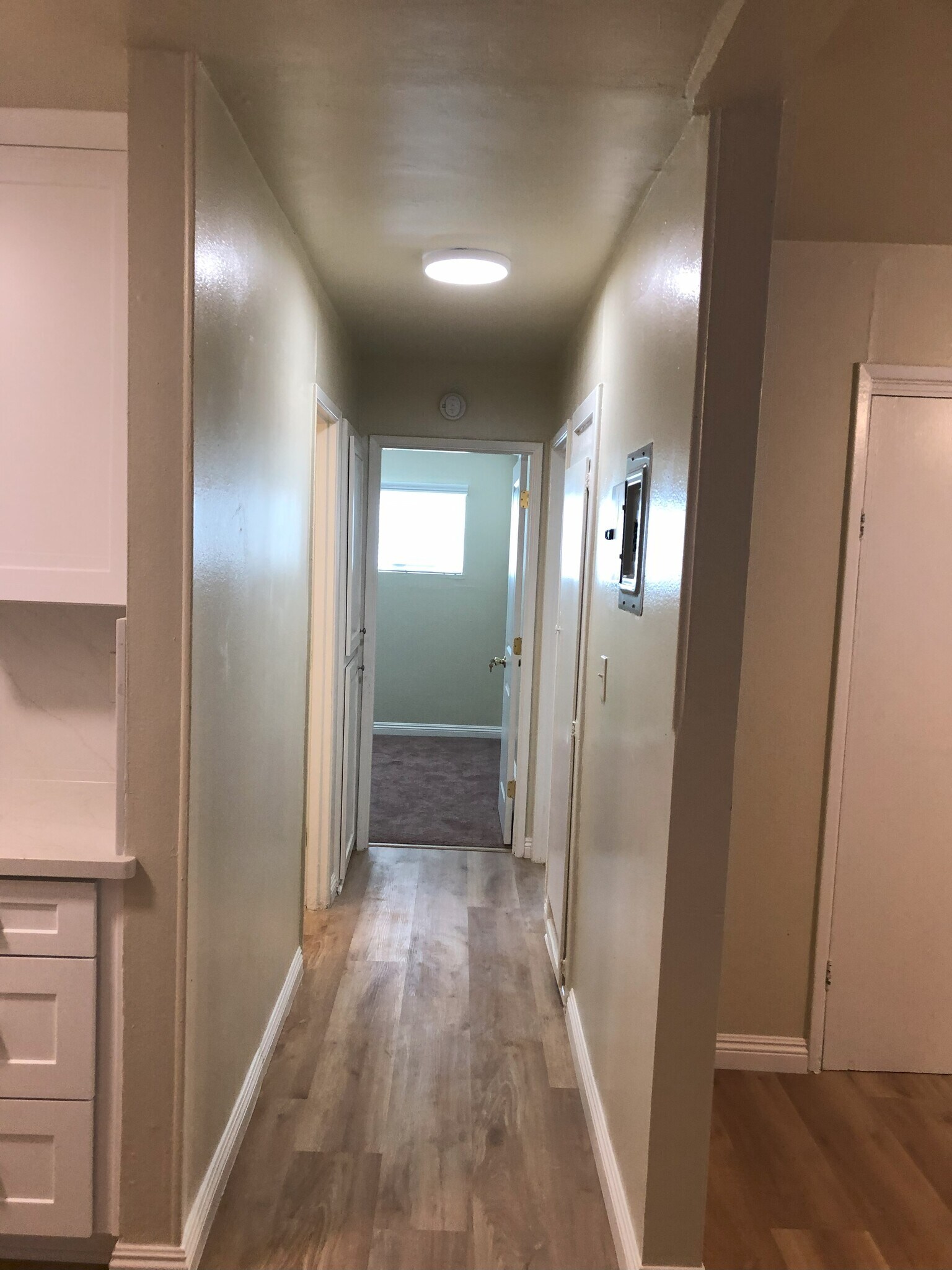 Hallway to bedrooms, linen closet and bedrooms - 9226 Palm St