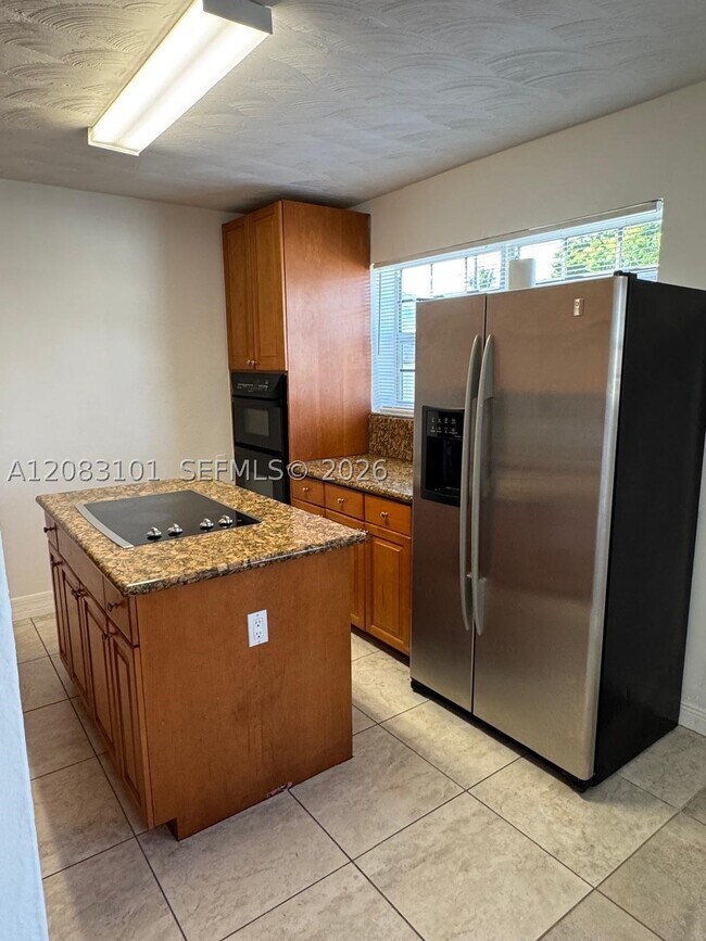 Building Photo - 3650 SW 92nd Ave