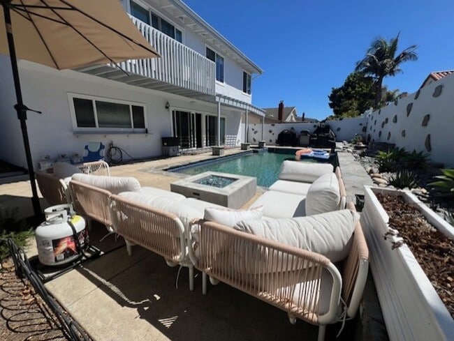 Building Photo - Coastal Elegance Meets Family Comfort in D...