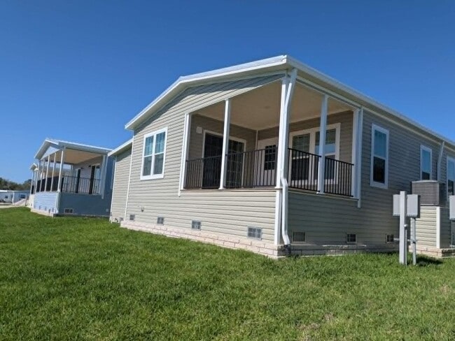 Building Photo - 5702 Blue Harbor Dr