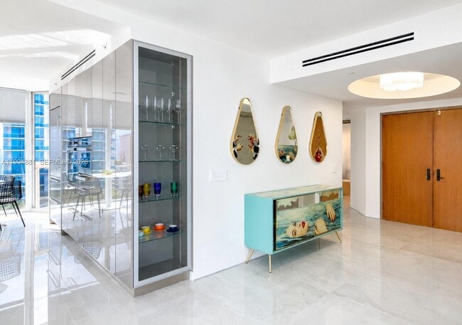 Building Photo - 17555 Collins Ave