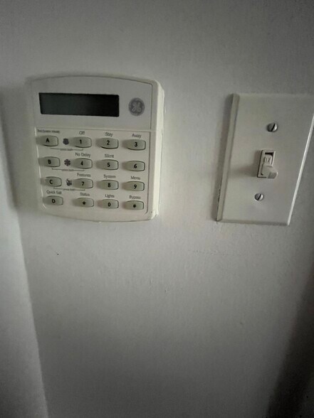 The in-unit security system can be set up easily. - 2910 Georgia Ave NW