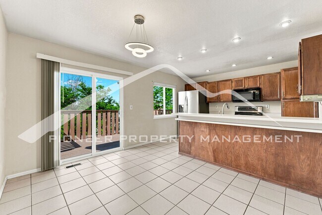 Building Photo - Spacious Home with Central AC and 2-Car Garage