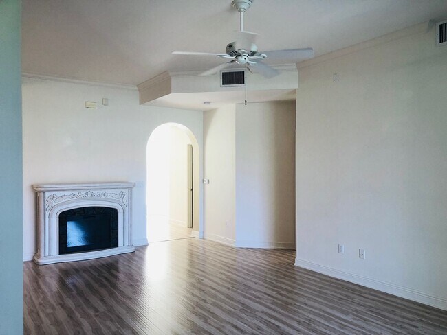 Building Photo - Experience Bell Tower Park. GATED ground floor 2 Bed 2 Bath Den 1 Car Garage Condo.