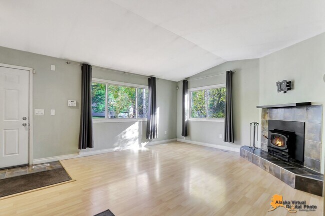 Building Photo - Eagle River Home w/ Fenced Yard, Sunroom, and Garage!