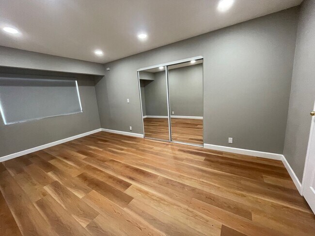 Building Photo - Spacious house with Skylights, Hardwood floors, Family room and Gardener