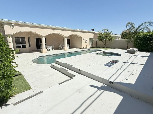 Building Photo - Spacious 4-Bedroom Home with Pool & Spa in...