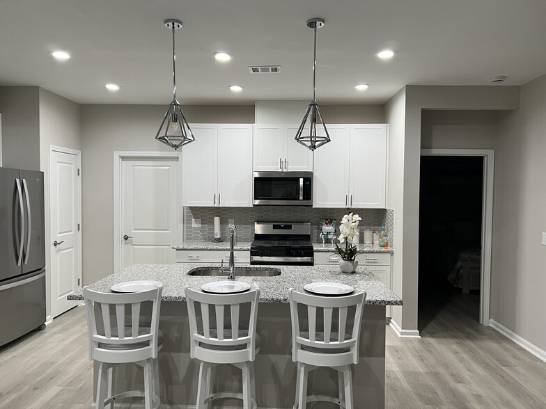 Kitchen with stainless steel steel appliances Why? - 119 Treasure Past Way