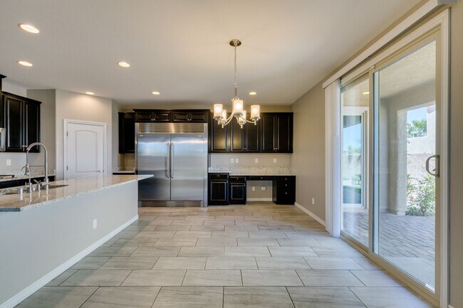 Building Photo - Beautiful Next-Gen Home with Private Entry Suite & Spacious Backyard