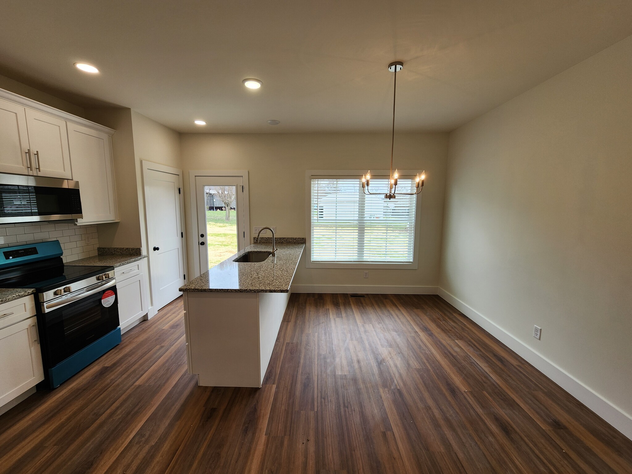 kitchen/dining from living room - 698 Miriah Dr