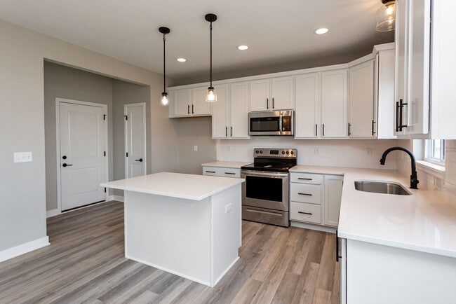 Building Photo - Spacious 4-Bedroom Home with 2-Car Garage & Yard