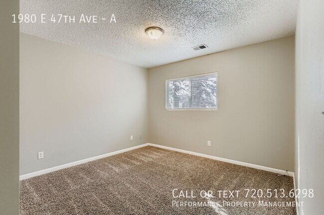 Building Photo - 1980 East 47th Ave.