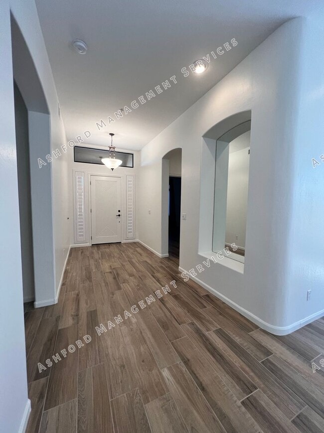 Building Photo - COME HOME TO LUXURY IN GATED GRAYHAWK GOLF...