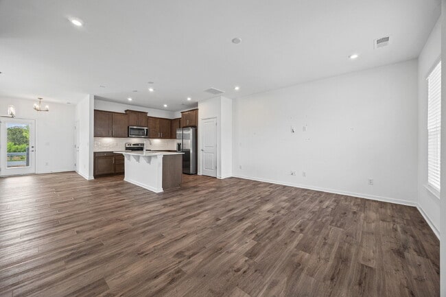 Building Photo - Spacious 3BR Townhome with Garage, Open Layout & Community Pool – Move-In Ready!