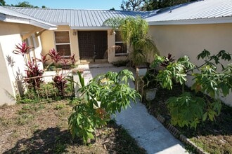 Building Photo - 3 Bedroom - 2 Bath - 2 Car Garage - Fenced Yard