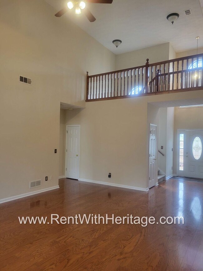 Building Photo - WOW!!...GORGEOUS HOME/HARDWOOD FLOORS/ UPGRADES GALLORE / SWIM - TENNIS