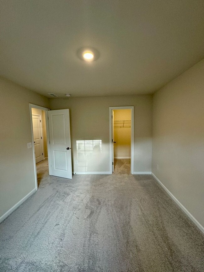 Building Photo - 4BR/2.5BA in Steel Creek's Brightwater Neighborhood