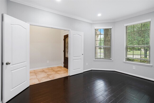 Building Photo - 22727 Whispering Timbers Way