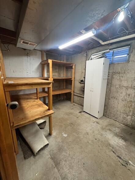 basement storage room - 5879 S Oak St
