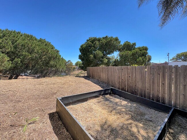 Building Photo - SD: Spacious 3BD/2BA Home in Oceanside with Large Backyard, In-Unit Laundry & Attached Garage