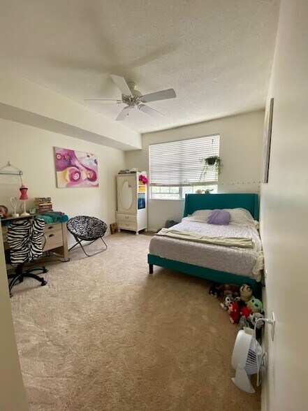 smaller one of the bedrooms - 5601 Bentgrass Dr