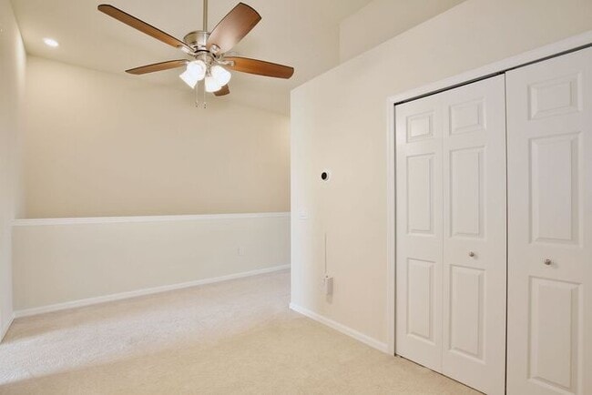 Building Photo - Immaculate Townhome · Dual En-Suite Bedrooms + Flex Loft · Cable & Internet Included · 3.5 Miles ...