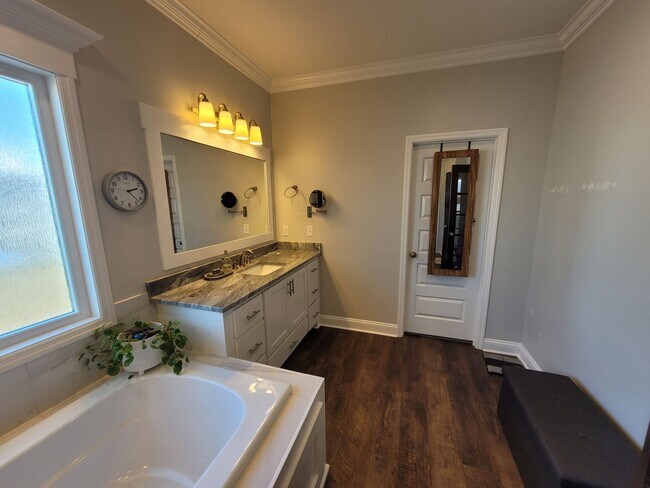 Building Photo - Spacious 4BR Home with Inground Pool, Open Split Floor Plan & Side-Entry Garage