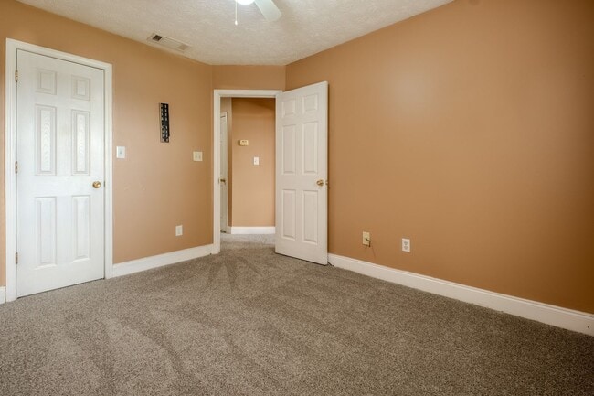 Building Photo - Spacious 4BR/3BA Townhome | Pet Friendly | Washer & Dryer Included | $1,600/mo
