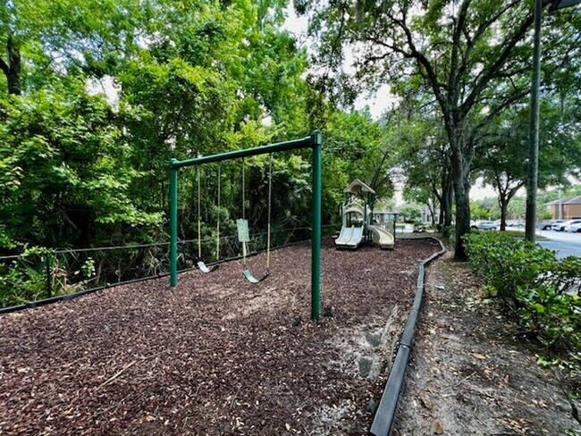 Building Photo - NEW-Remodeled bathroom & kitchen! NEW VINYL PLANK flooring & fresh paint! 2 bedroom 1 bath condo ...