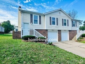 Building Photo - Updated Kitchen, Composite Deck and Refrig...