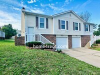 Building Photo - Updated Kitchen, Composite Deck and Refrig...