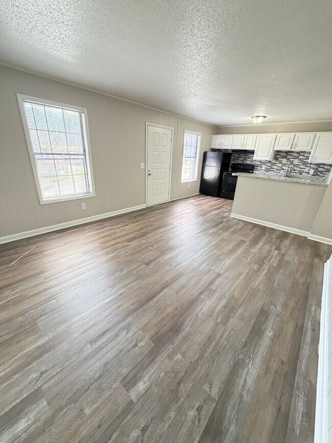 Building Photo - April Savings Are Here! Application Fee WAIVED ALL month!