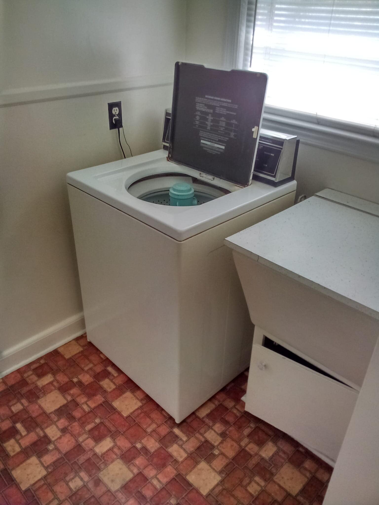 Washing Machine and Wash Basin Near Side Entrance Next to Kitchen - 207 Sunflower Ave