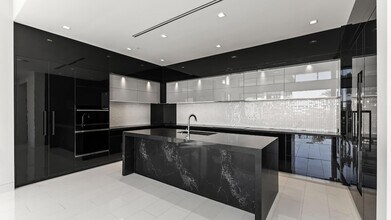 Building Photo - 6587 N Palmeraie Blvd