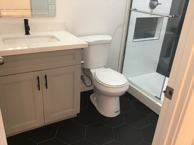 Building Photo - Corner Unit Townhome with Style and Substa...