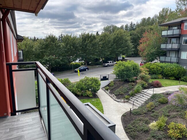 looking south out of balcony. (NE 70th Street is beyond and Burke-Gilman Trail is on the right. - 7001 Sand Point Way NE