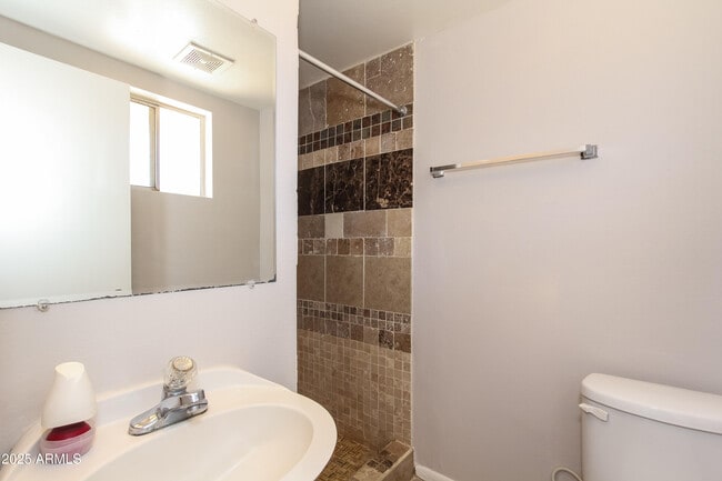 Building Photo - 8435 W Heatherbrae Dr