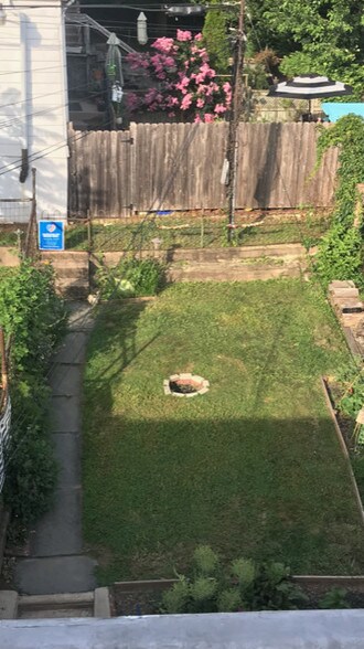 Backyard w/ firepit - 5113 Rochelle Ave