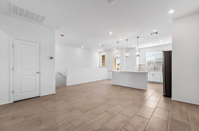 Building Photo - Modern Cadence Townhome with Open-Concept Living & Energy-Efficient Features!