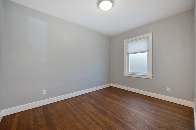 Building Photo - Renovated Duplex unit in the heart of Elmh...