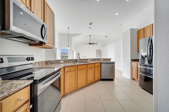 Building Photo - Stunning 4/3 with Fence Enclosed Yard in t...