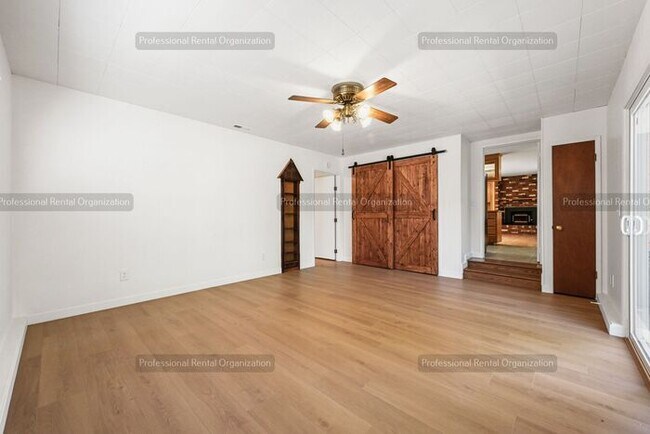 Building Photo - Look No Further, this home has it all- Hot Tub, Sauna, EV Charger, Solar, KOI Pond & More