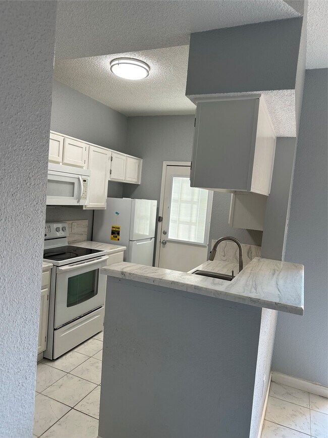 Building Photo - 7575 Cambridge St